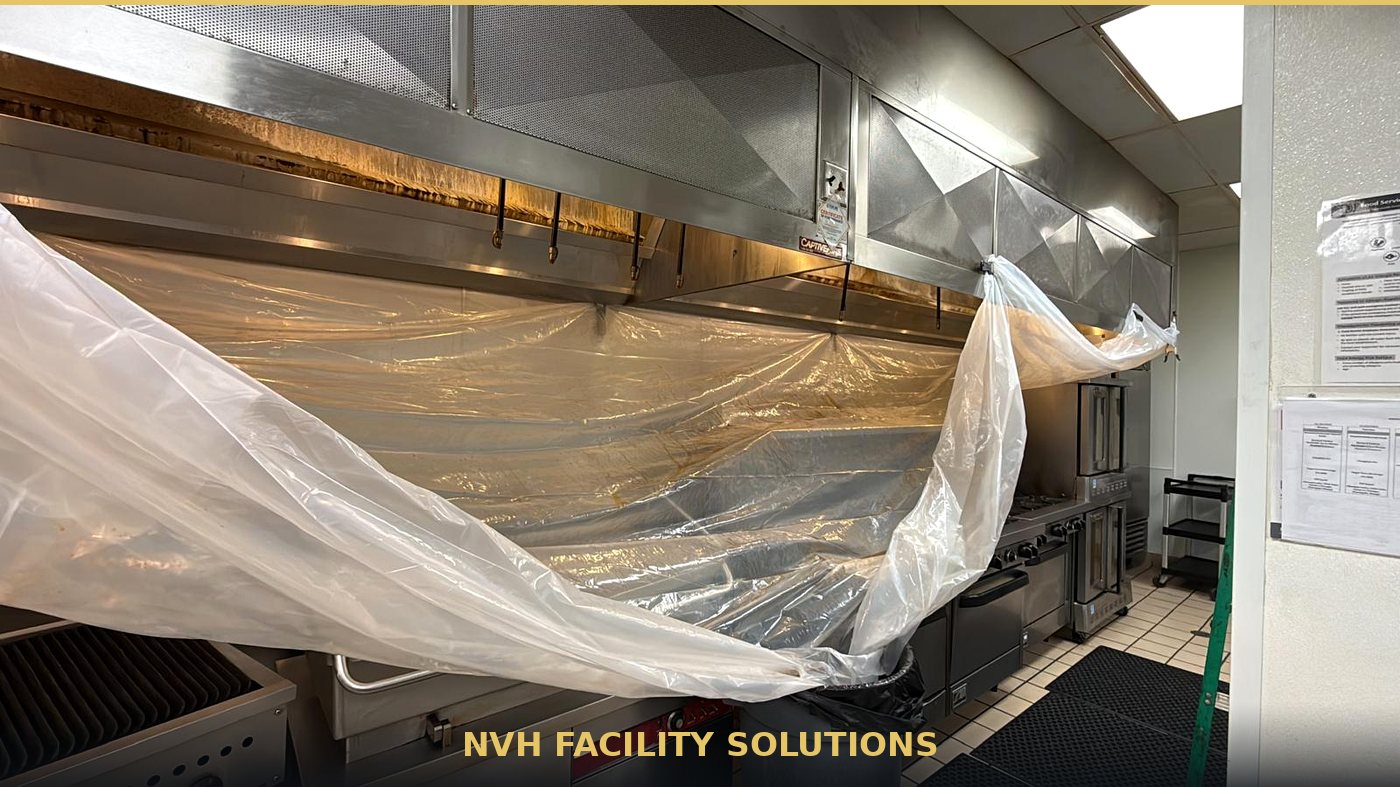 Plastic sheeting and funnel installed under a kitchen hood to catch grease and washdown runoff